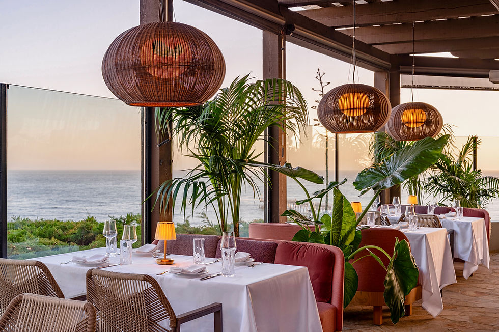 Marisella dining room with pendant lights and ocean view